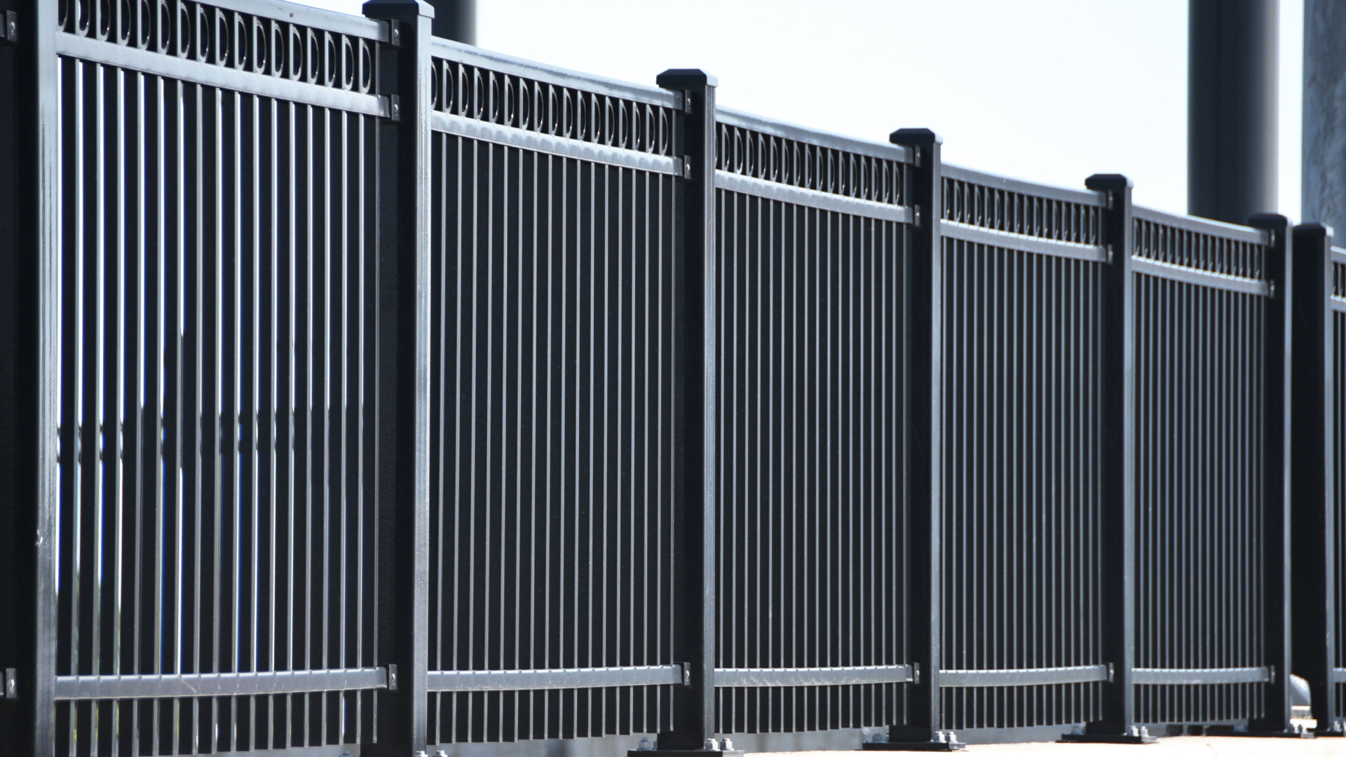 Commercial aluminum fence installation in Southeast Florida