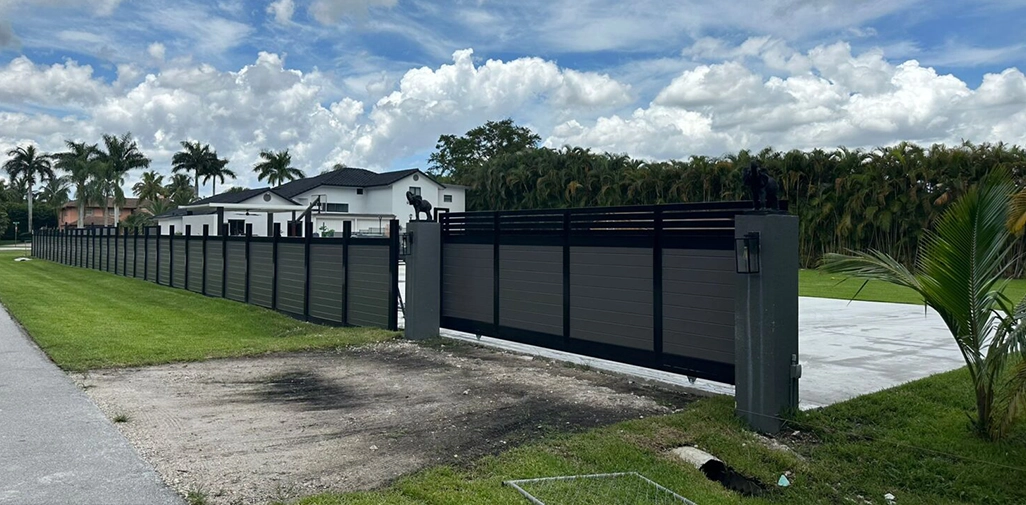21-foot PVC rolling gate installation in Southeast Florida